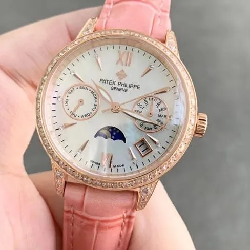 top-tier replicaPatek Philippehigh-quality ladies white dial pink belt fully automatic movementleather strap watch front view