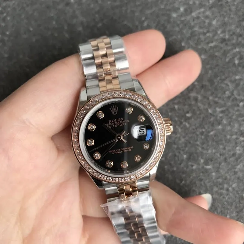 Rolex Datejust women's watch, 28mm, mechanical bezel with diamonds, rose gold case, black dial, front view
