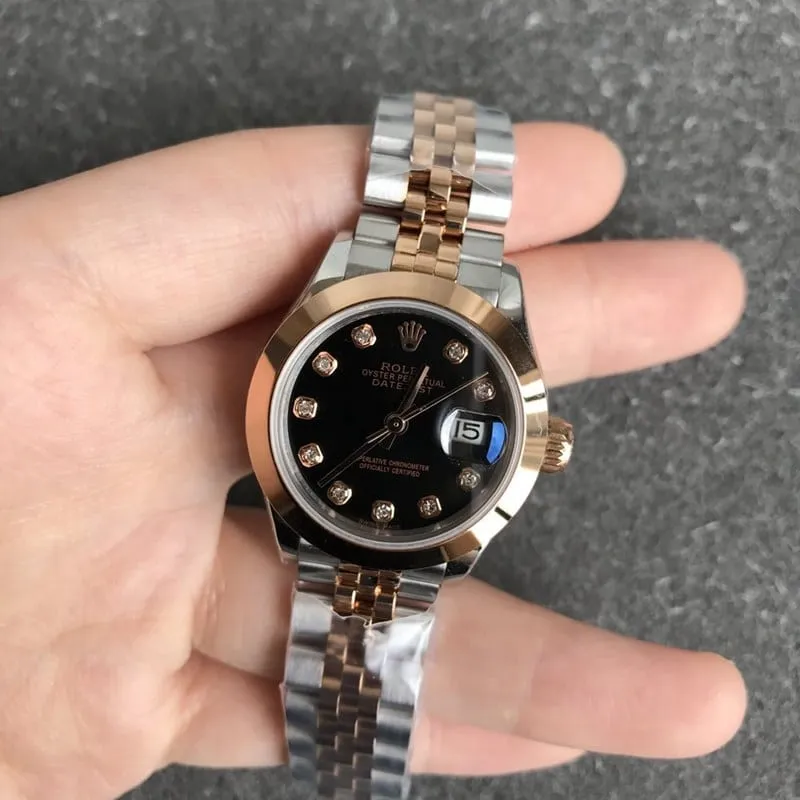 Rolex Datejust 28mm mechanical watch, fluted bezel, rose gold, black dial, diamond hour markers, front view