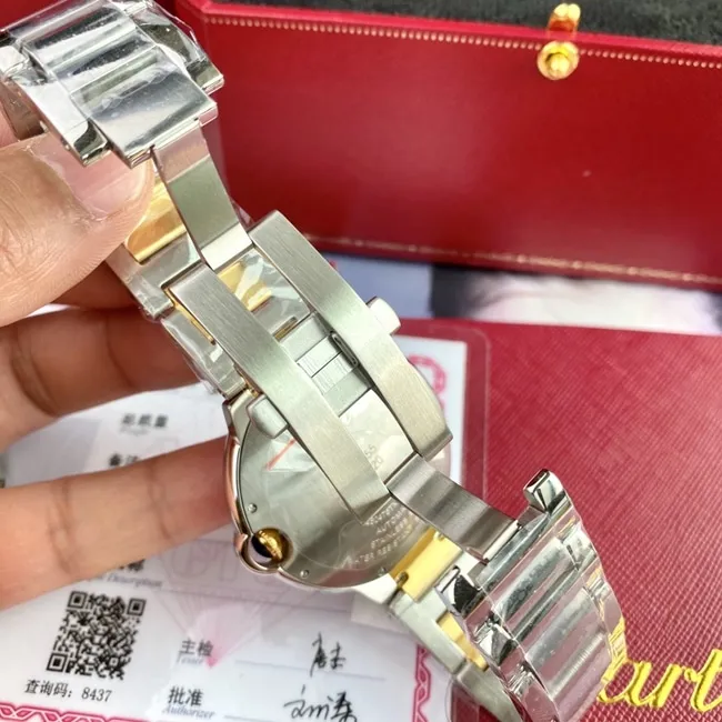 Original watch Cartier men's white dial gold band 42mm automatic movement blue balloon series watch front view