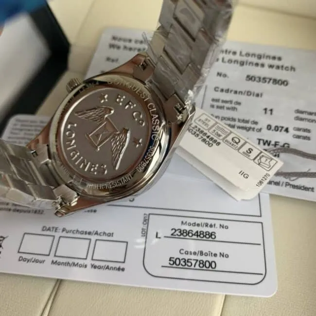 Longines Compaq series white steel blue background diamond ladies quartz watch 8 mm ultra-thin design side view