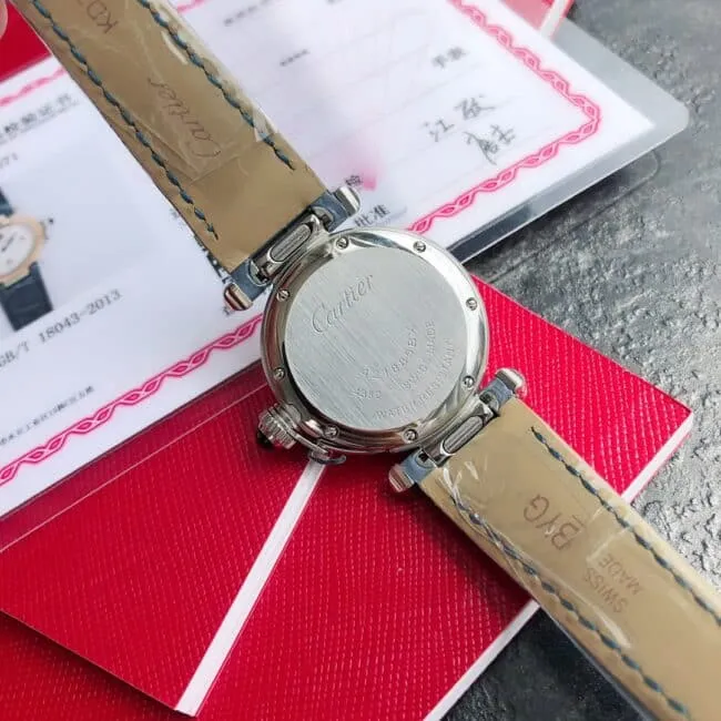 top-tier Cartier model 3 blue gold ladies watch side view