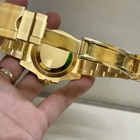 Top-tier watch Rolex men's blue dial gold band blue Submariner automatic movement watch front view