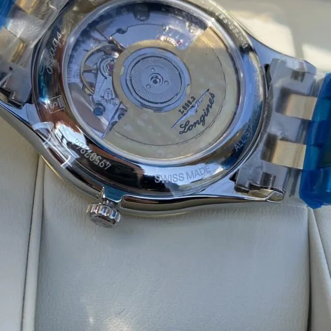 top-tiersuper cloneLongines military flag series white steel Swiss carved movement couple watch front view