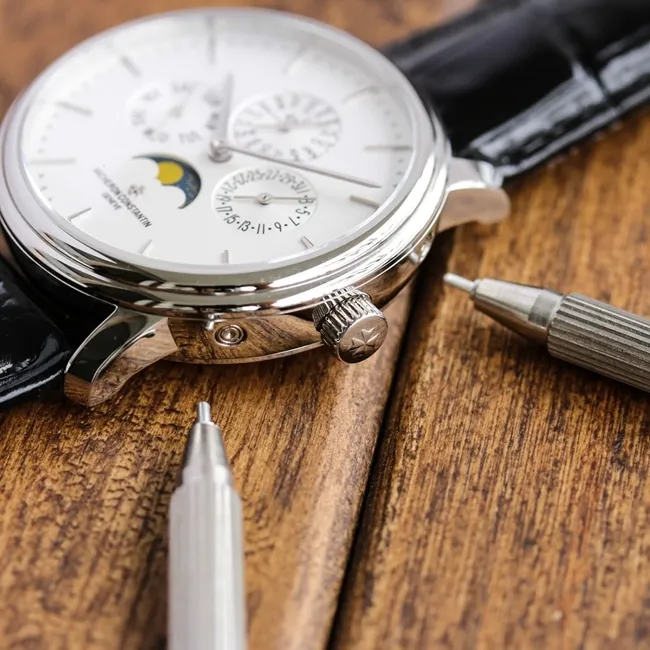 TW factory top-tier Vacheron Constantinreplica watch men's white dial black belt mechanical leather strap heritage series perpetual calendar multi-function watch front view