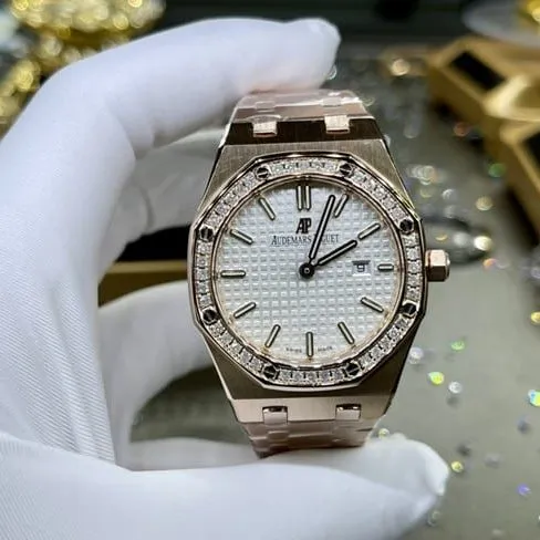 top-tier watch Audemars Piguet men's white dial gold band Royal Oak automatic movement watch front view