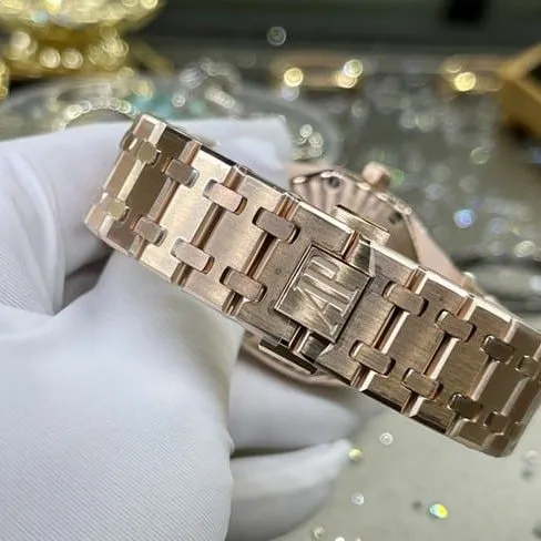top-tier watch Audemars Piguet men's white dial gold band Royal Oak automatic movement watch front view