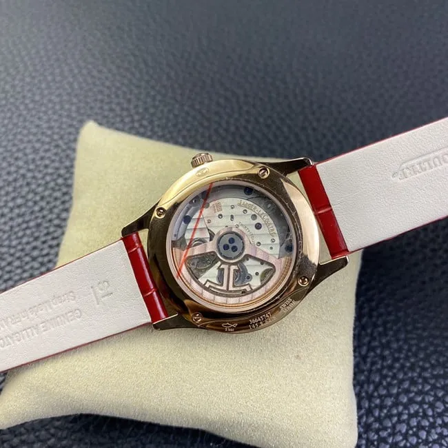 Jaeger-LeCoultretop-tier watch ladies white dial red dot moon phase master automatic movementleather strap front view