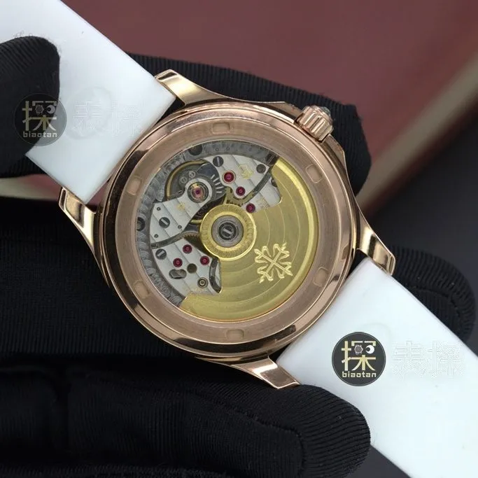 Grenade series Patek Philippe1:1replica watch women's 18Kwhite dial ring diamond lumerubber strap side view
